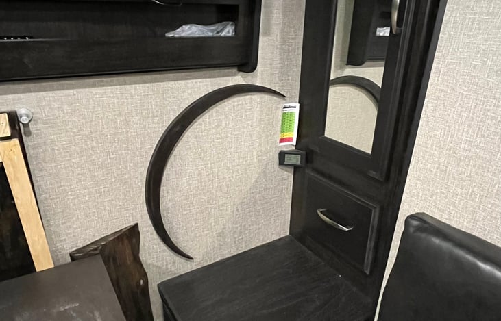 To the right of the moon is a battery status display.