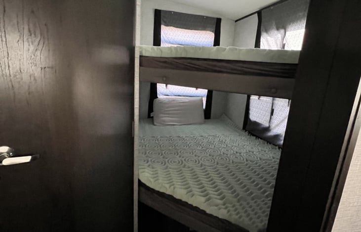 Double over Double bunk beds with memory foam mattresses.