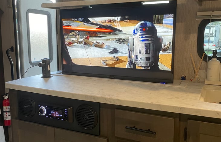 Tv lifts from counter space.