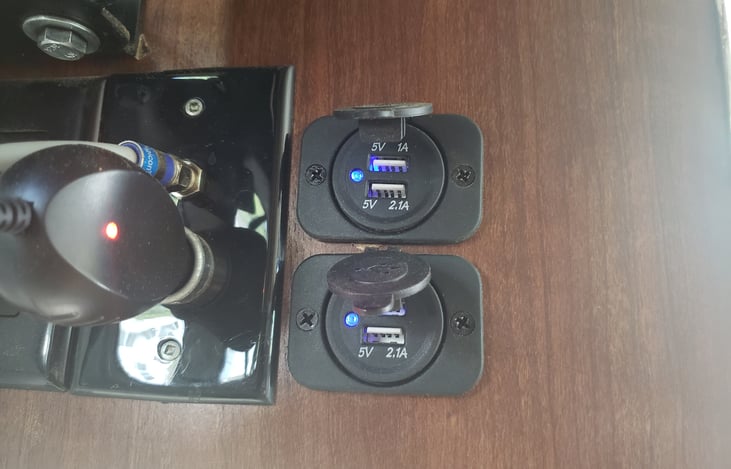 4 additional UBS ports next to the large flat-screen TV.