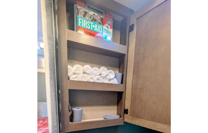 Vanity cabinet and first aide kit
hand towels, toothbrush cup and soap dish provided