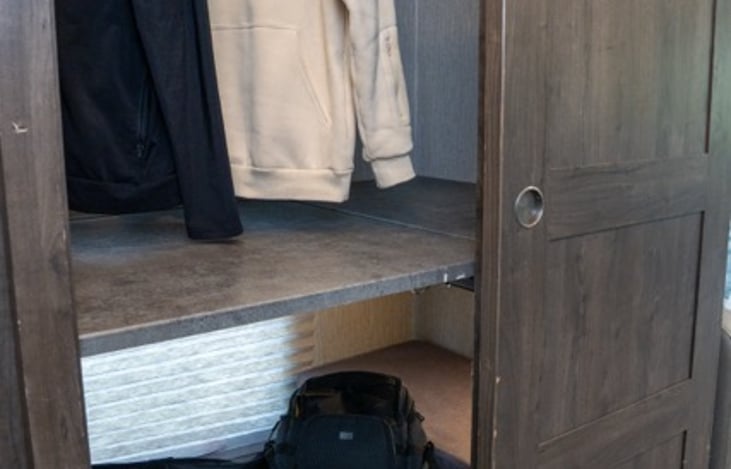 bunkhouse can also be utilized as a large closet with tons of hanging and storage space.  Makes the perfect place to store luggage and hanging clothes.