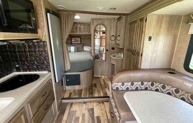 The slide provides extra room when parked but keeps the RV slim on the road.
