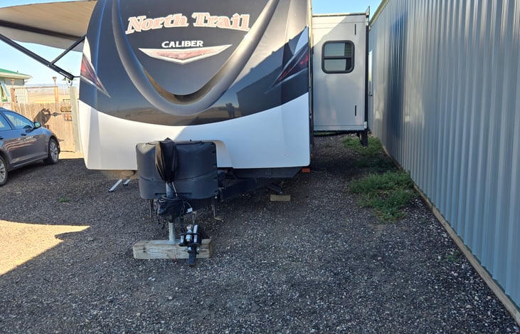 front view with dinette slide and awning out