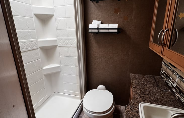 Bathroom shower, toilet and sink.  Toilet paper provided (please do not use regular toilet paper - it clogs the black water tank).