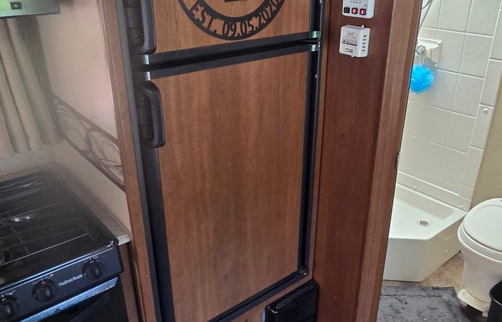 fridge and freezer with ice cube trays