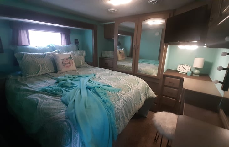 Enjoy a much needed rest after a long day of making memories in our super comfortable queen bed! There is a second slide out in the queen bedroom! Plenty of storage cabinets and drawers plus a flat screenTV