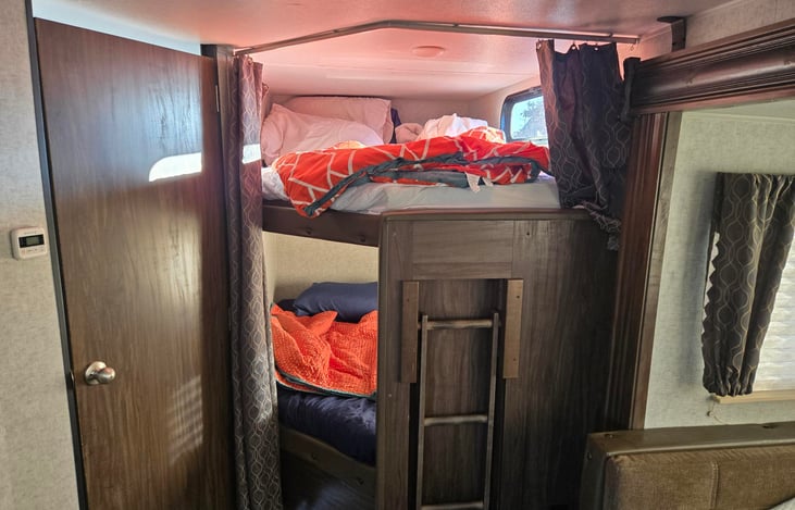 2 bunks can sleep 2 people each, each level has outlets and usb chargers