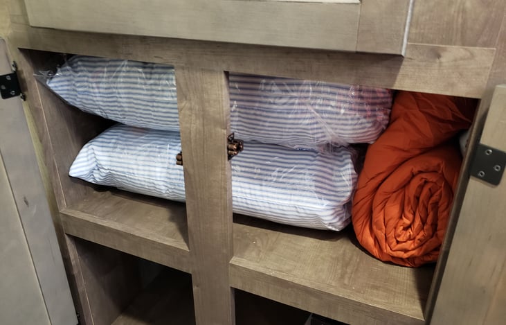 The travel trailer comes stocked w/ bedding for all beds