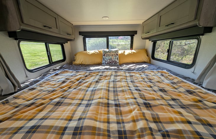 Large slide at the back has a cozy King bed.