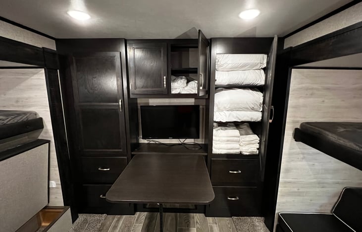 Extra pillows, linens, towels, and hand towels