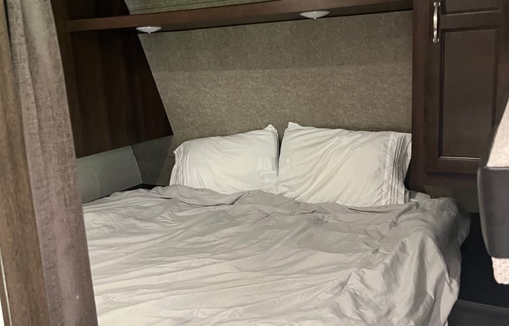 Queen size master with side closets.