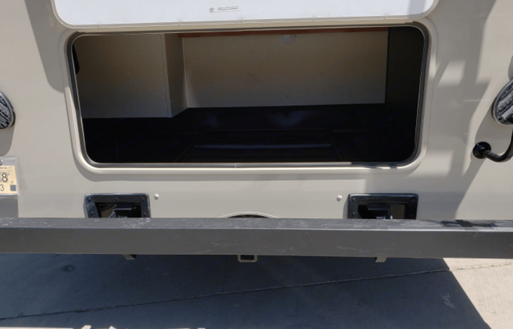 Rear storage compartment