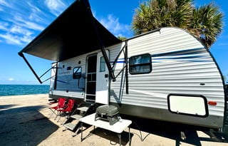 Fully furnished travel trailer for a small family.