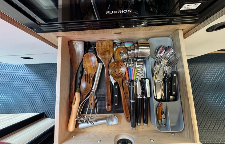 Silverware and cooking utensils included