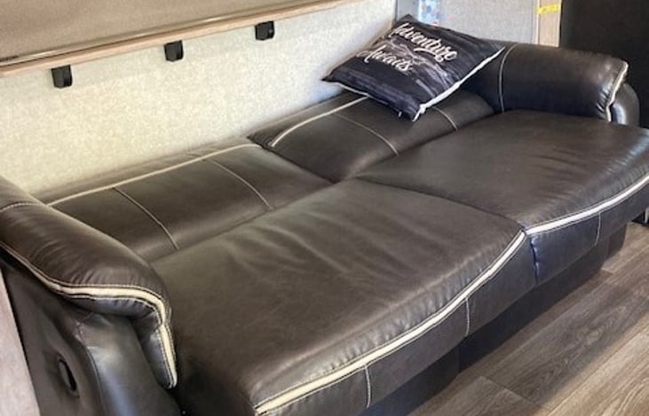 Couch folds out to futon - sleeps 1 or 2 depending on person's size.