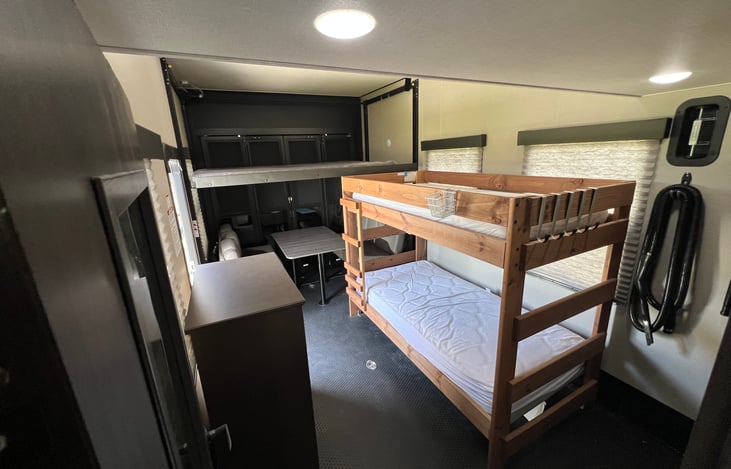 Comfortable bunk beds in the garage to accompany the standard happy jack bunk system.