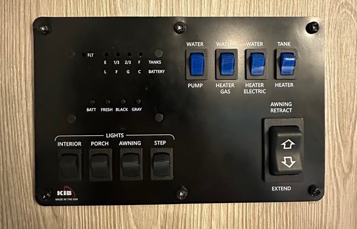 Easy to use control panel for lights, awning, and tank level monitoring.