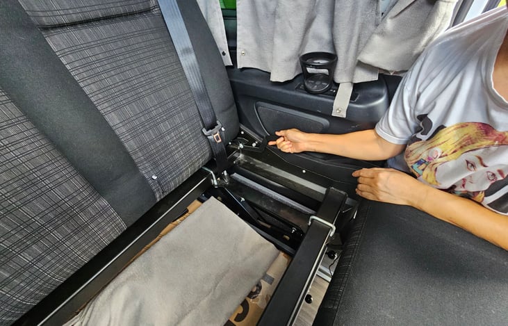 Unlock rear seat back.