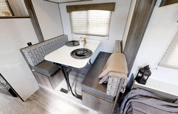 Dining table converts to 5th bed.