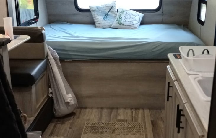 Great Full-Size Bed for two, with tons of underneath storage and natural light
