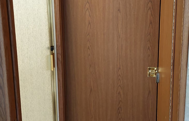 Pocket door to bedroom.