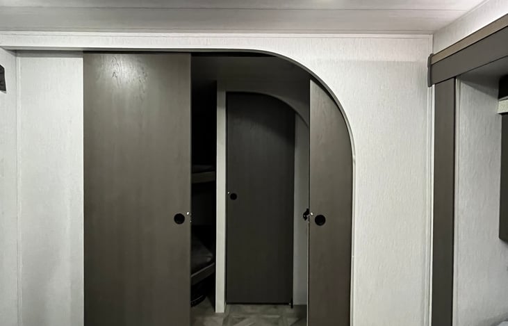 Privacy door for bunkroom and then another radius private door for half bath