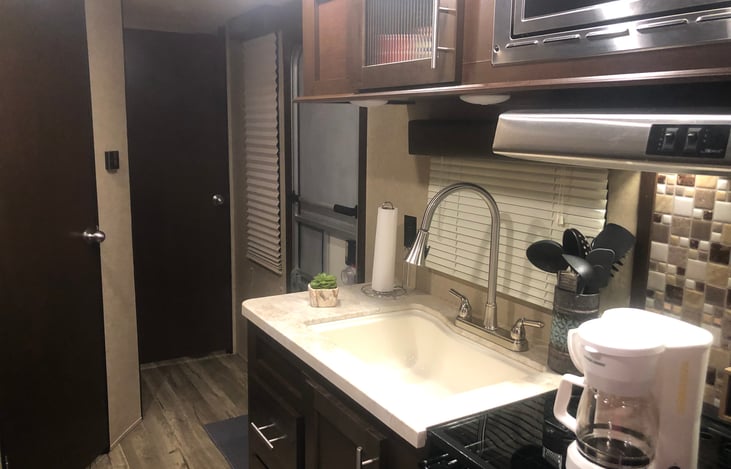 Kitchen area from the cargo/dining room table area