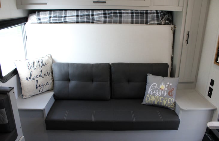 Murphy bed transitioned to a couch.