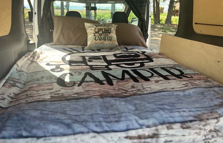 Comfy double bed that sleeps two.  Can sleep a person up to 6'5" tall.