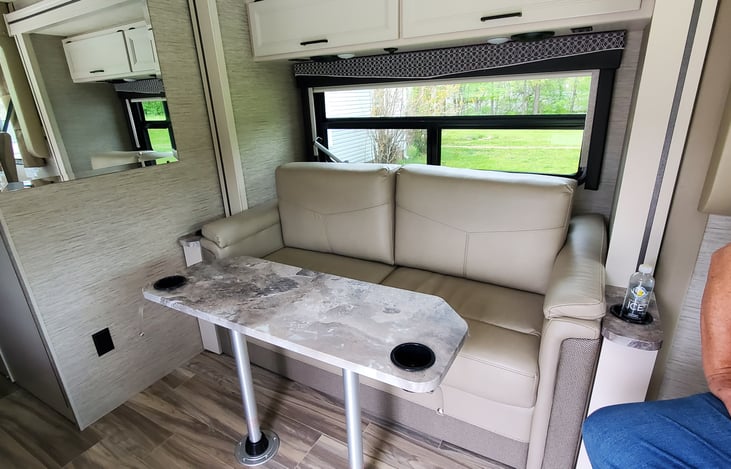 couch with slide out and table set up