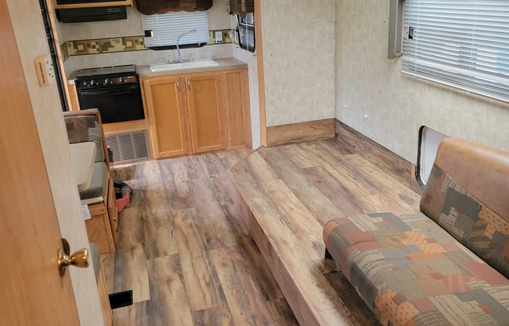 Included: "42"x67" area for camping chairs or sleeping pad next to fold out couch or just a place for sleeping bags, luggage etc.