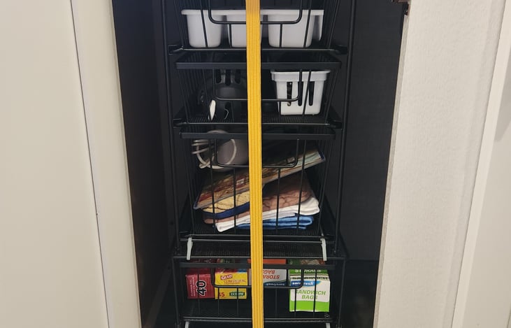 Flatware, kitchen utensils,  plastic wrap, foil, stoage bags and some basic spices.