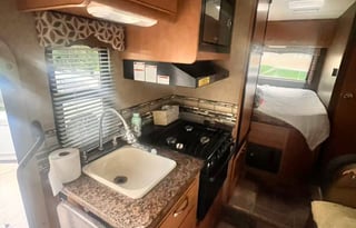 Ready go! Comes with a grill, pillows, cookware...