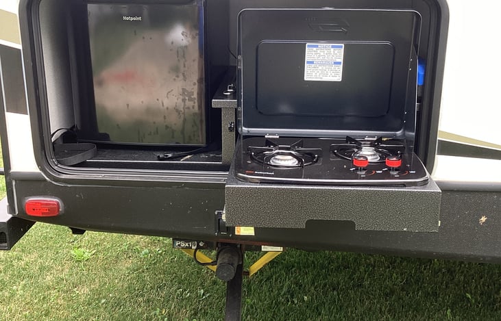 Outside fridge and stove