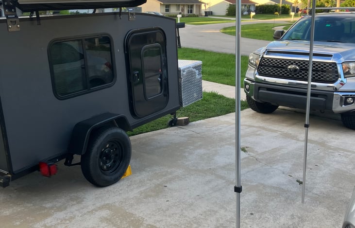 The RV comes with a 6' awning mounted on the roof rack