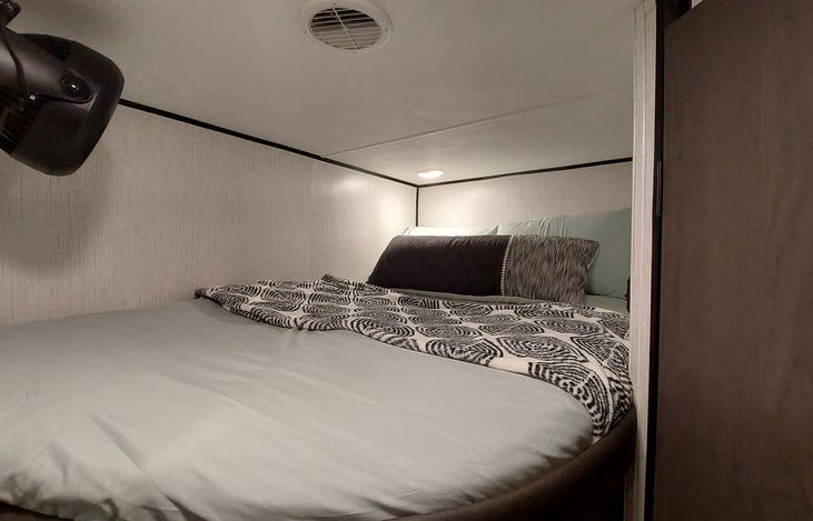 Bunk #2 has a 300lb weight limit posted on the wall and has its own fan for additional air circulation. It also has plenty of pillows for comfort
