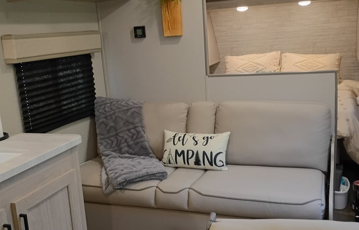 Sofa can expand into bed for one person if needed.
