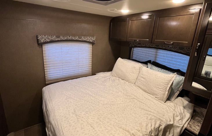 Queen bed in the rear (master bedroom)