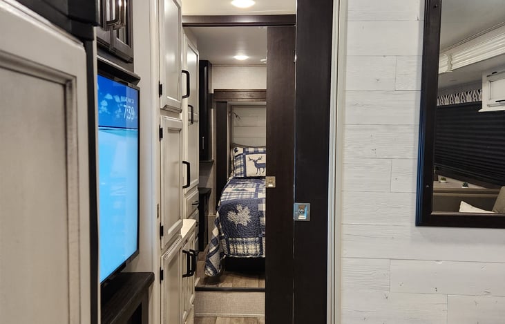 Privacy pocket doors on bedroom and bathroom areas