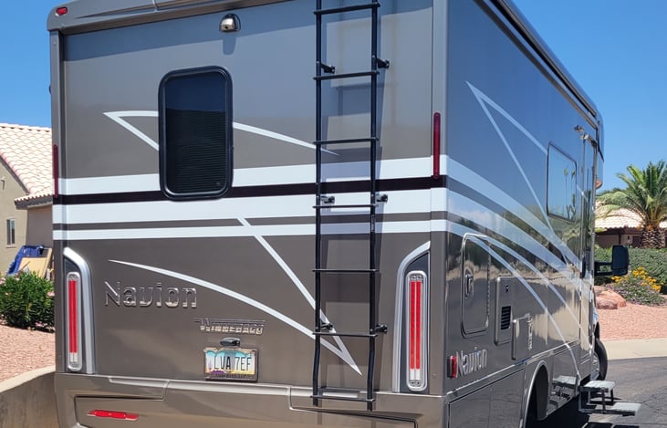 Rear of RV, optional bike rack attaches to trailer hitch.