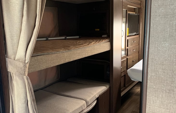 Bunk house with two TVs