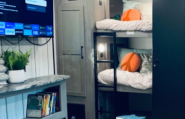 Both bunks have upgraded mattresses that are Tempur-Pedic foam, have USB charging stations and cubby's for personal items at easy reach! sliding door also allows for privacy.