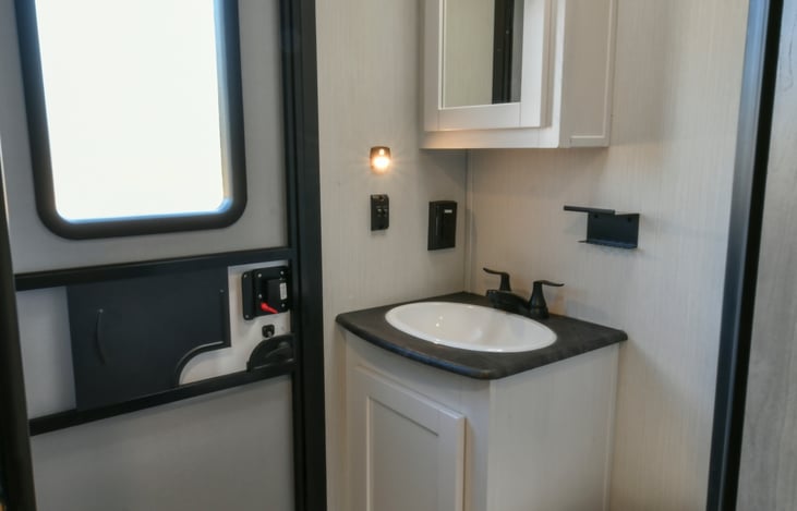 door leading outside from half bath