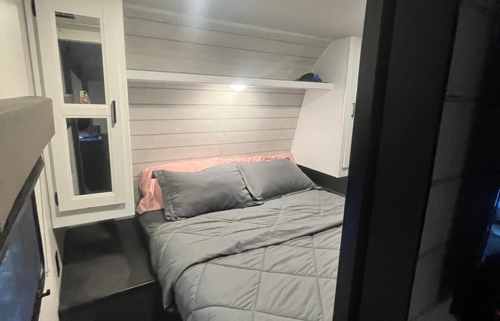 Queen bed.  Bed also lifts up for easy storage. Closets on each side