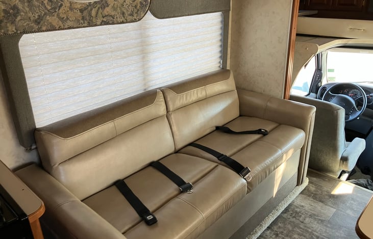 Jack knife couch converts to full bed.