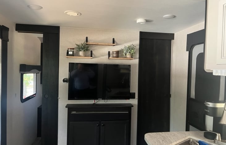 12 volt TV, can hook up a play station or other HDMI device for apps etc, mount has a swivel so it can be turned.