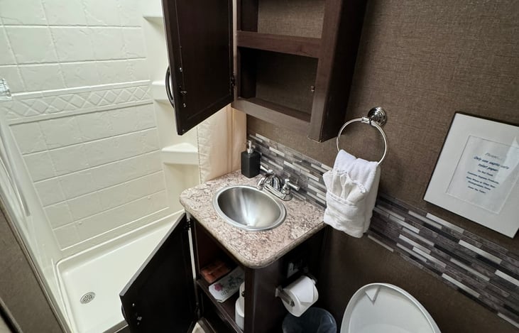 sink, hot/cold shower and foot flush toilet