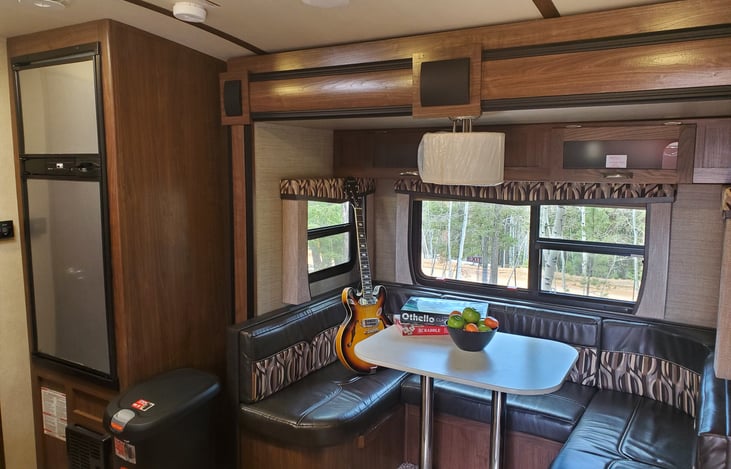 Dinette area converts into comfy sleeping space!