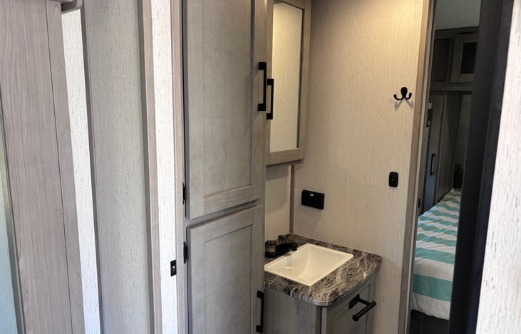 Pass-through bathroom to master bedroom.